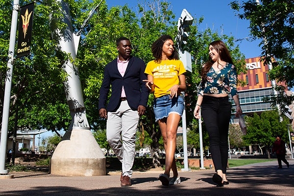 Three Barrett students walking through the Downtown campus