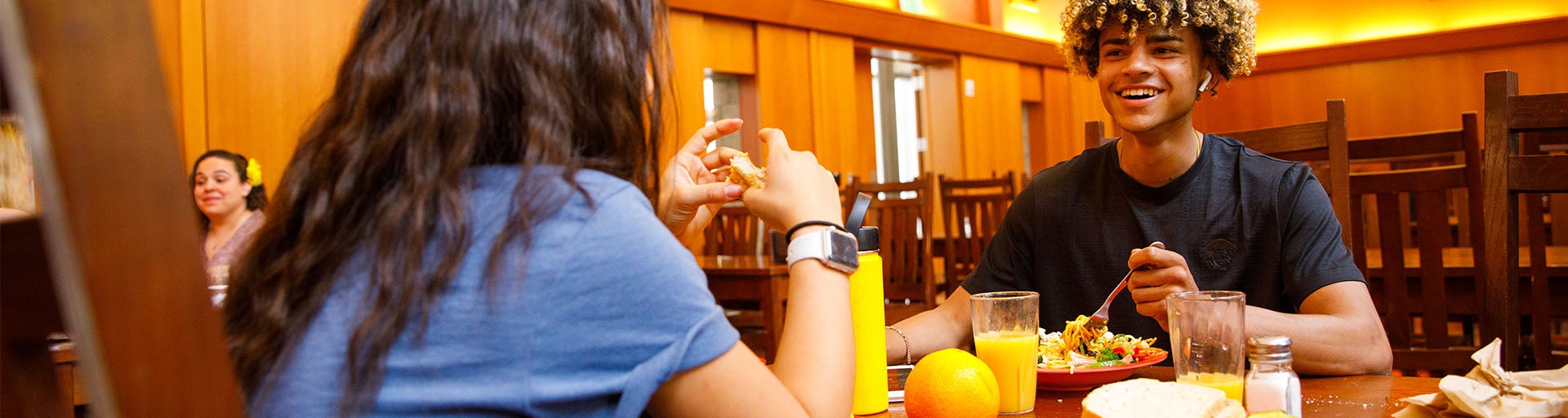 Two Barrett students enjoying a meal at the Mark Jacobs Dining Hall