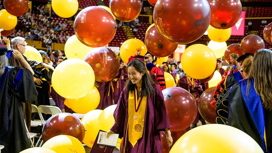 ASU graduate at commencement celebration
