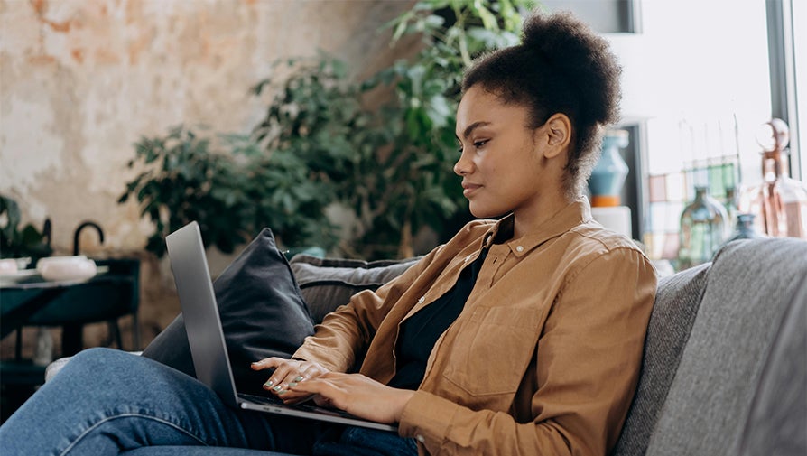 Female working on a laptop