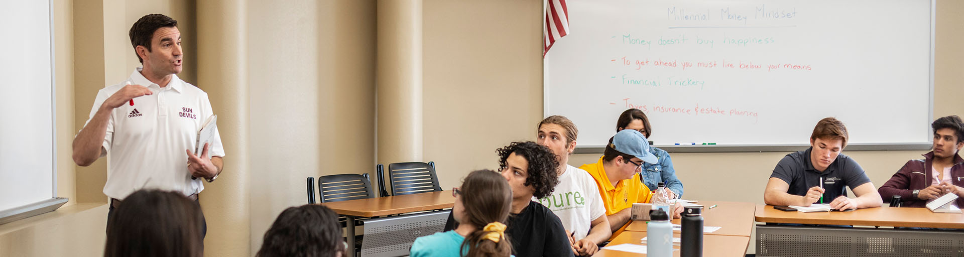 Barrett alumni lecturing Barrett students in a classroom environment