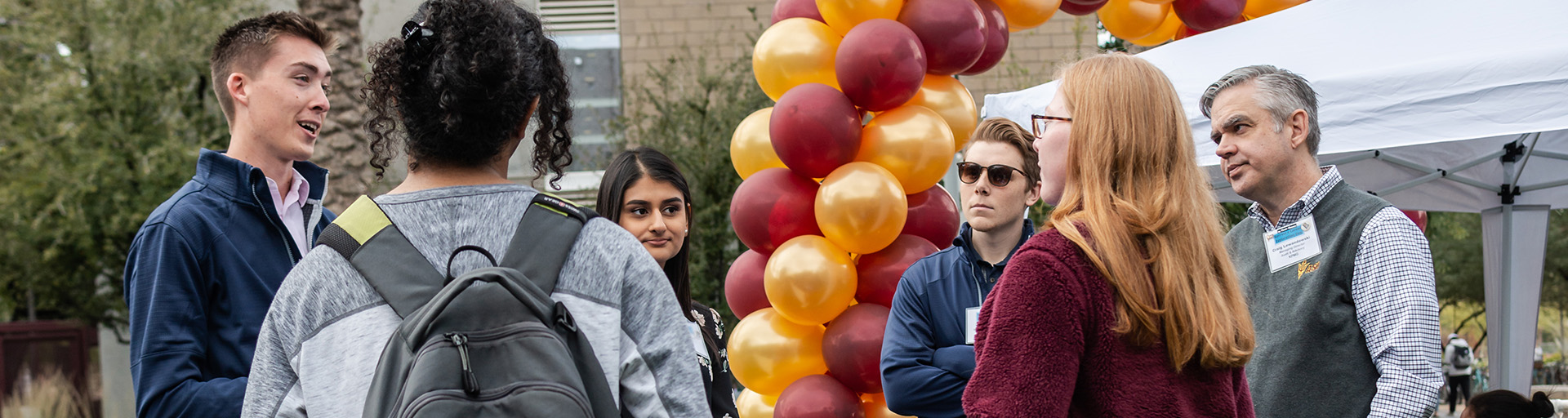Group of students at an outdoor networking event